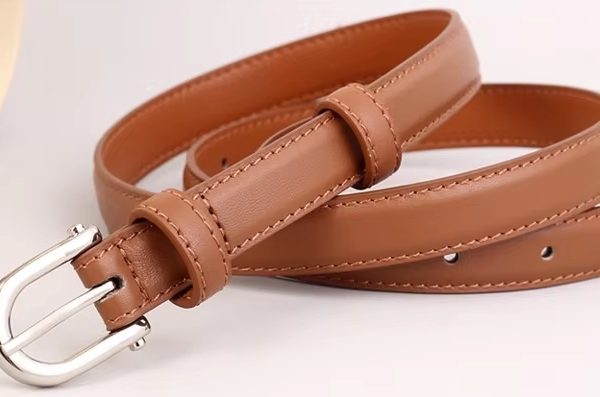 The Custom Touch. An  exquisitely crafted belt defining  your waistline.