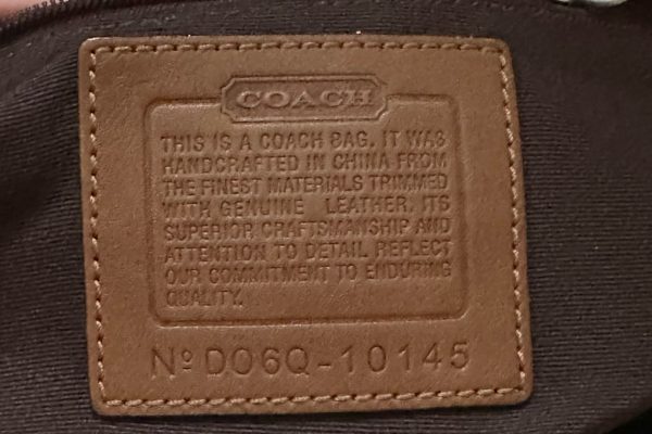 COACH story patch with date code highlighted